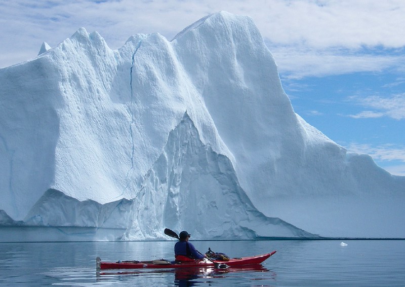 218-East Greenland 2007 - Paul passing a massive berg - PC berg EG 8.7 .jpg